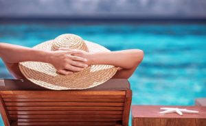 photo of a woman relaxing at the pool