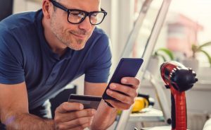 photo of a man shopping online